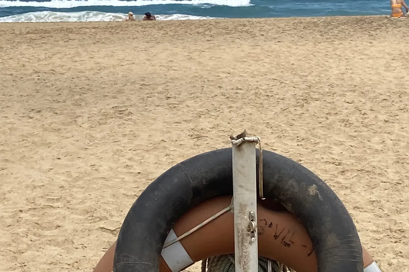 A lifebuoy on Cofete beach, facing the ocean