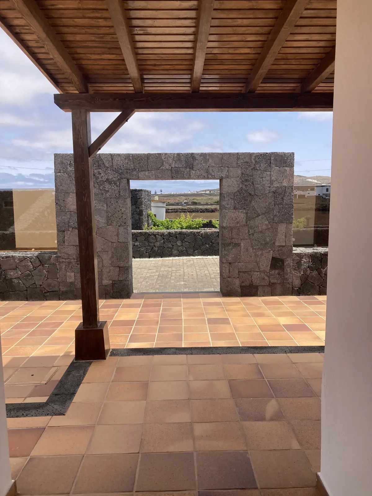 Terrace and volcanic stone wall of the villa booked near Arrecife, Lanzarote