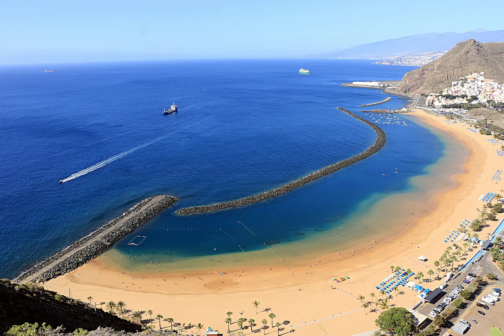 Golden sand and palm trees of Las Teresitas beach near Santa Cruz, Tenerife